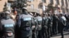 Armenia - Riot police deployed during an anti-government demonstration in Yerevan, 6Feb2014.