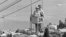 Vacationers enjoy a low-frills aerial lift in Yalta, 1968.