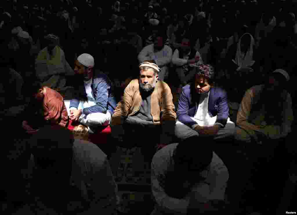 Afghan men perform Friday Prayers inside a mosque during the holy month of Ramadan in Kabul. (Reuters/Omar Sobhani)