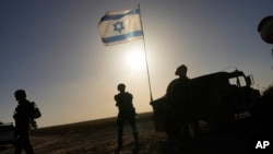 Ushtarë izraelitë afër kufirit mes Izraelit dhe Gazës. 4 mars 2024. 