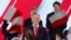 Karol Nawrocki, candidate for the 2025 Polish presidential election supported by Poland's right-wing Law and Justice (PiS) party, addresses supporters as exit polls were announced during their election night event at the Mala Warszawa Theatre in Warsaw, P