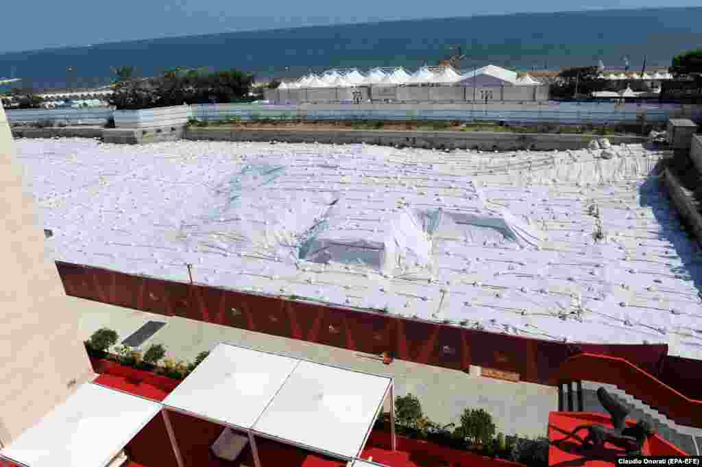 An installation by Christo at the Lido in Venice, Italy, in August 2011, one day before the opening of the 68th annual Venice Film Festival.