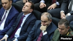 Armenia - Prime Minister Nikol Pashinian, Defense Minister Davit Tonoyan and army chief Artak Davtian (R) attend an event in 2019.