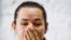 BELARUS -- Presidential candidate Svyatlana Tsikhanouskaya reacts during a news conference after the Belarusian presidential election in Minsk, August 10, 2020