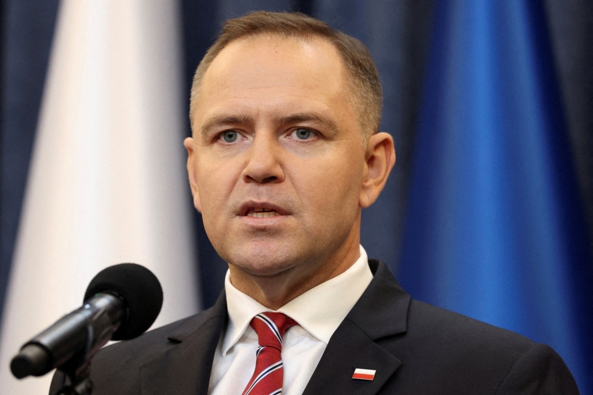 FILE PHOTO: Polish President Karol Nawrocki gives a statement to media at the presidential palace in Warsaw
