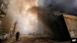 Smoke rises from the site of an Israeli air strike in south Beirut on October 2. 