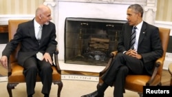 U.S. President Barack Obama (R) with Afghan President Ashraf Ghani in the Oval Office at the White House in Washington. (March 24, 2015)