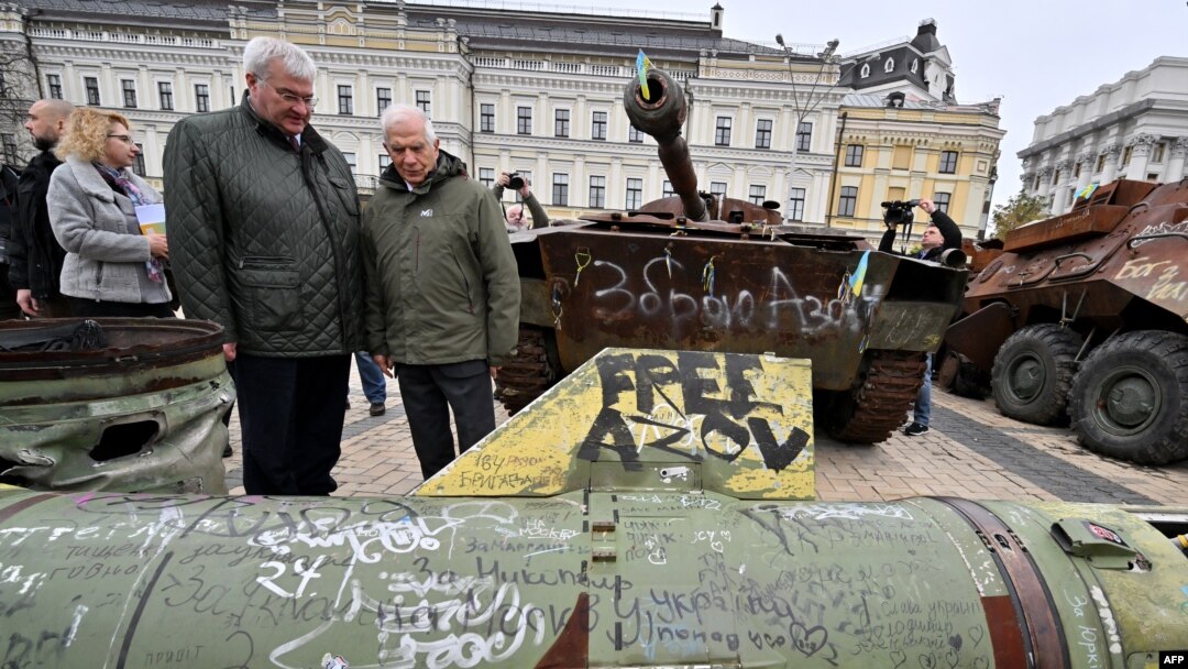 EU foreign policy chief Josep Borrell (right) and Ukrainian Foreign Minister Andriy Sybiha examine destroyed Russian military equipment at an open-air exhibition in Kyiv on November 9.