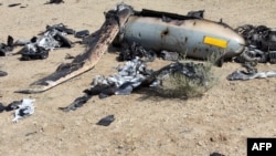 A picture released by the official website of Iran's Revolutionary Guards on August 25 shows an alleged Israeli drone that was shot down above the Natanz uranium-enrichment site. 