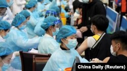 Masovna vakcina na COVID-19 u kineskom gradu Kingdao (30. mart 2021.)