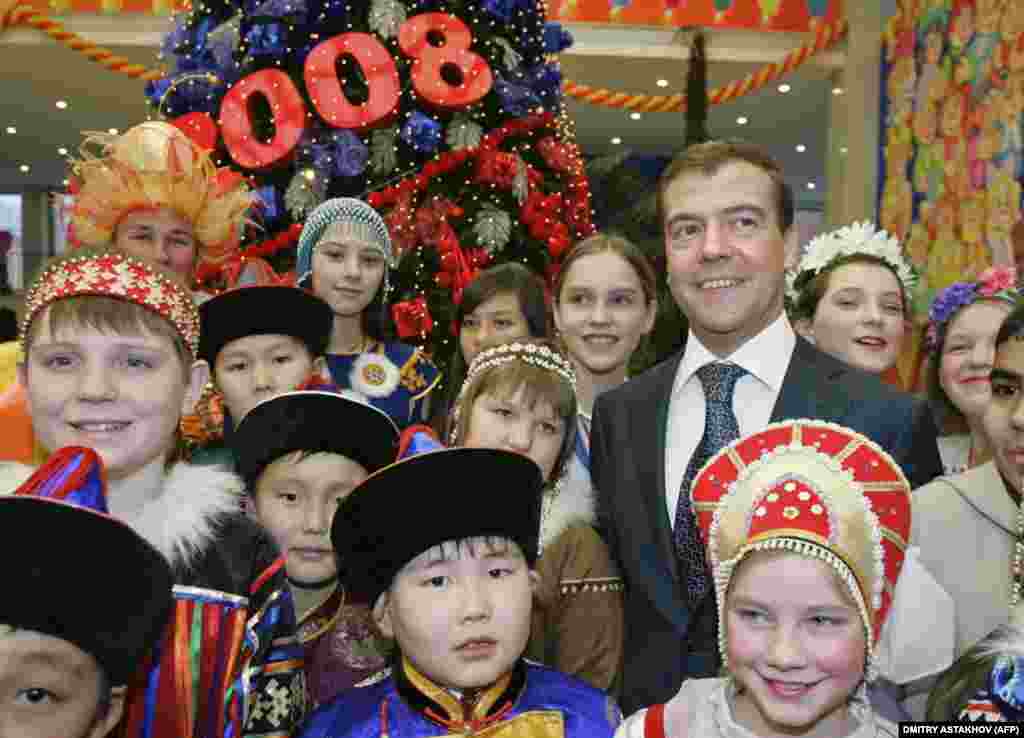 In 2005, Putin appointed Medvedev first deputy prime minister, giving him the power to implement large domestic projects. In this 2007 photo, Medvedev smiles at the All-Russian New Year&#39;s Party at the Kremlin.&nbsp;