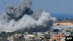 Smoke billows after an Israeli air strike in Rafah in the Gaza Strip on October 16. The recent outbreak of hostilities in the region could benefit both China and Russia. 