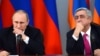 Armenia - President Serzh Sarkisian and his Russian counterpart Vladimir Putin at a news conference in Yerevan, 2Dec2013.