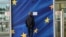 Belgium - A man looks at a sign announcing that a door is closed for security reasons at the European Commission’s Berlaymont building in Brussels, on September 22, 2014. 