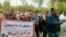 A protest by Iranian steel workers over unpaid wages on March 17, 2018. The banner mocks the regime by saying, "They don't pay us - Death to America".