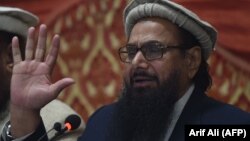 Kreu pakistanez i organizatës Jamaat-ud-Dawa (JuD) Hafiz Saeed, gjatë një konference shtypi në Lahore, 23 janar 2018