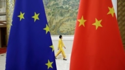 Amid an intensifying rivalry between Beijing and Washington, the EU is treading a line between its values on human rights and its desire to gain deeper access to China's economy.