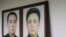 Portraits of North Korea's founder and former leader Kim Il Sung (left) and his son and current leader Kim Jong Il. No confirmed photos exist of Kim Jong Il's presumed successor, his son Kim Jong Un.