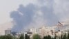 Smoke billows for the second day from the Shahran oil depot, northwest of Tehran, on June 16, 2025.