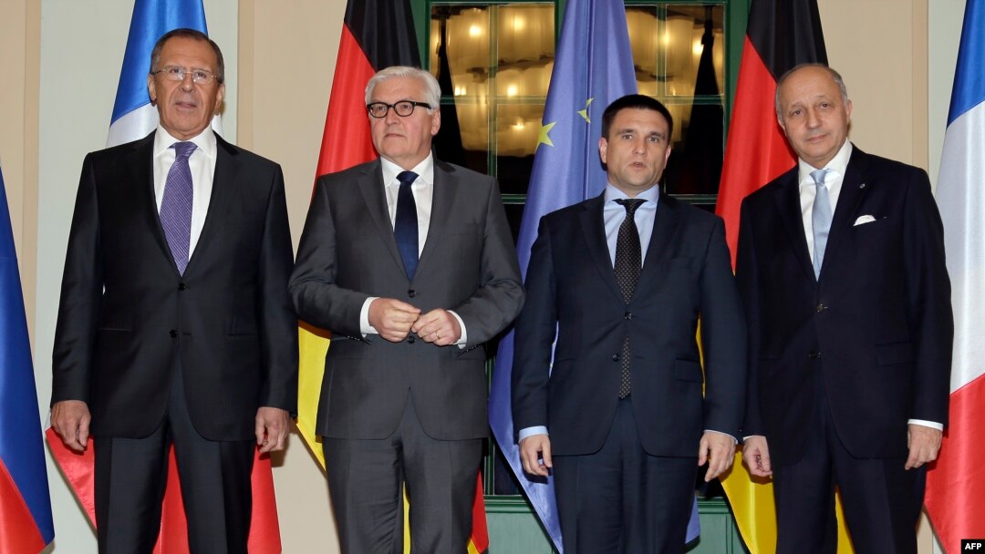 Russian Foreign Minister Sergei Lavrov, German Foreign Minister Frank-Walter Steinmeier, Ukrainian Foreign Minister Pavlo Klimkin and France's Foreign Minister Laurent Fabius ahead of their meeting in Berlin.