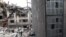 A building in central Tehran is in ruins following an air strike on March 27.