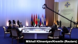 KAZAKHSTAN -- Officials, including Russian President Vladimir Putin (C), attend a meeting of the Collective Security Treaty Organization (CSTO) in Astana, November 8, 2018