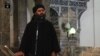 The man purported to be Abu Bakr al-Baghdadi appears in the video