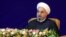 "Our economy will not prosper as long as it is monopolized [by the government]," said Iranian President Hassan Rohani. (file photo)