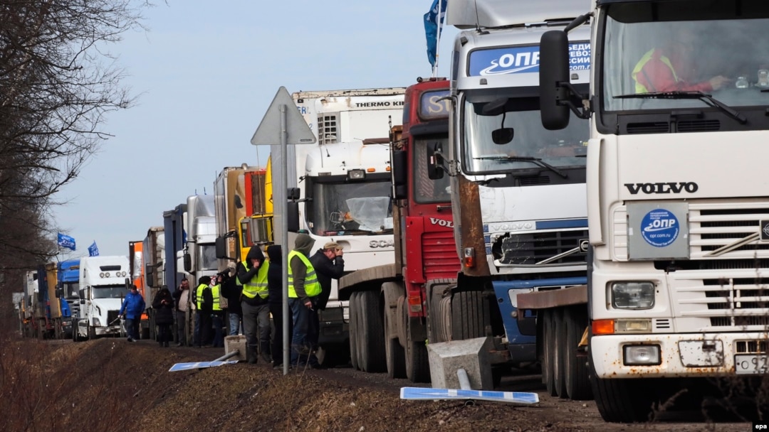 Truck drivers near St. Petersburg take part in protests against a road tax.

