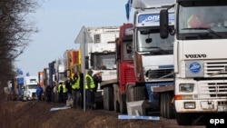 Truck drivers near St. Petersburg take part in protests against a road tax.
