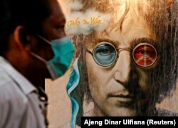دیوارنگاره‌ای از جان لنون در زمانه کرونا