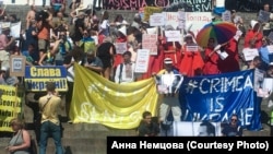 Протест у столиці Фінляндії за день до зустрічі в Гельсінкі президента США Дональда Трампа і президента Росії Володимира Путіна, 15 липня 2018 року