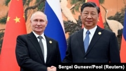 Vladimir Putin i Si Đinping tokom Foruma Pojas i put u Pekingu 18. 10. 2023.