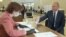 Russian President Vladimir Putin casts his vote at a polling station at the Russian Academy of Sciences on July 1.