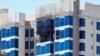 Damage to a residential building is visible after an Iranian drone attack on Kuwait City on September 3.