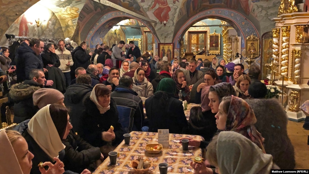 Attendees of the Peter and Fevronia Club mingle at Moscow's Dormition Church.