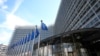 Belgium - European Union flags flap in the wind outside EU headquarters in Brussels, March 25, 2024.