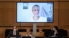 UN envoy Anais Marin is seen speaking via video link before a meeting of the United Nations Human Rights Council on allegations of torture and other serious violations in Belarus in September 2020.