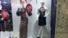 Turkmenistan. Shop window in Ashgabat. Mannequins. January 2019