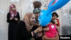 Prima zi a acordului de încetare a focului d etreei zile, Gaza City, 5 august 2014.