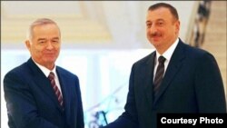 Ислом Каримов Илҳом Алиев билан бирга.