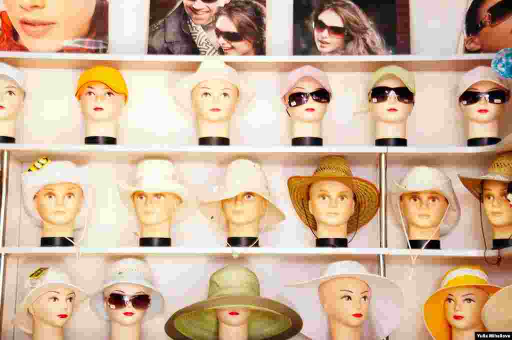 Sun-defying hats and sun glasses
