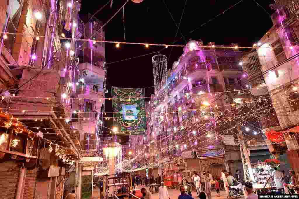 &nbsp;A view of an illuminated street for the celebrations of Mawlid al-Nabi, the anniversary of the Prophet Muhammad&#39;s birth, in Karachi, Pakistan.