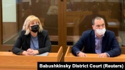 Olga Mikhailova and Vadim Kobzev, lawyers for Aleksei Navalny, in court in Moscow in April. 