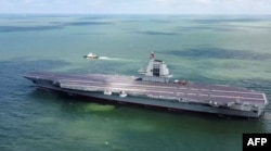 Третій китайський авіаносець «Фуцзянь» проводить ходові випробування в морі в невідомому місці. Травень 2024 року