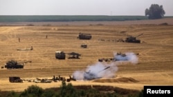 Ізраїльська артилерія обстрілює позиції «Хамасу» у Смузі Гази, 23 липня 2014 року