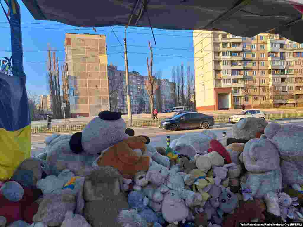 Mourners pile up toys to commemorate the victims of a missile attack on a residential building in Dnipro, Ukraine, on January 14.&nbsp;