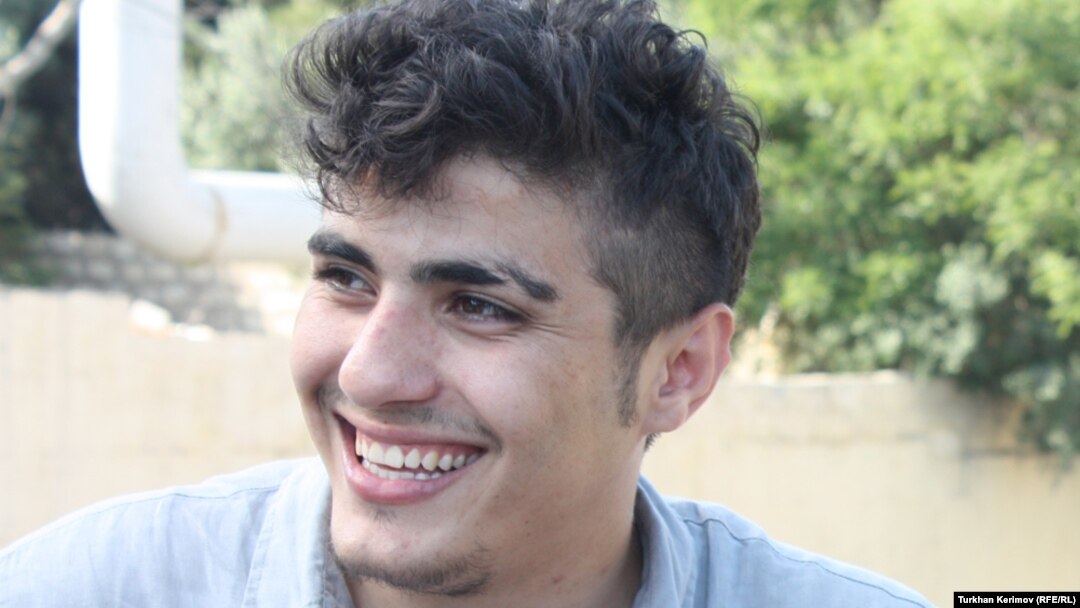 Azerbaijani photographer Mehman Huseynov after his release on June 13