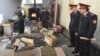 FILE: Officers of Tajikistan's Drug Control Agency burn seized drugs in Dushanbe.