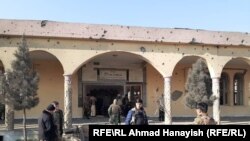 Soldiers patrol near a mosque next to Bagram that was damaged by the attack on December 11.